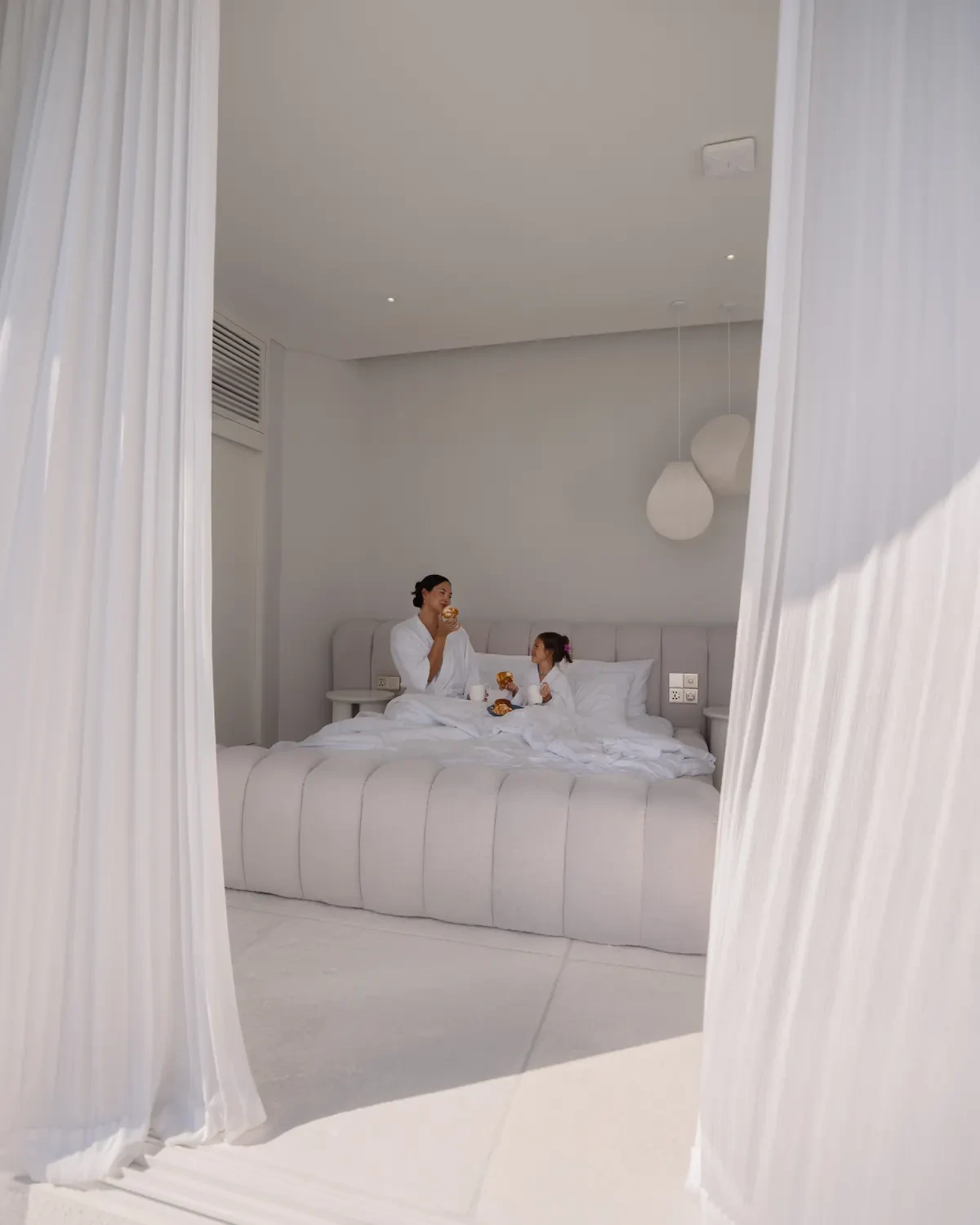 Mom and daughter morning breakfast in bed: byduran family life