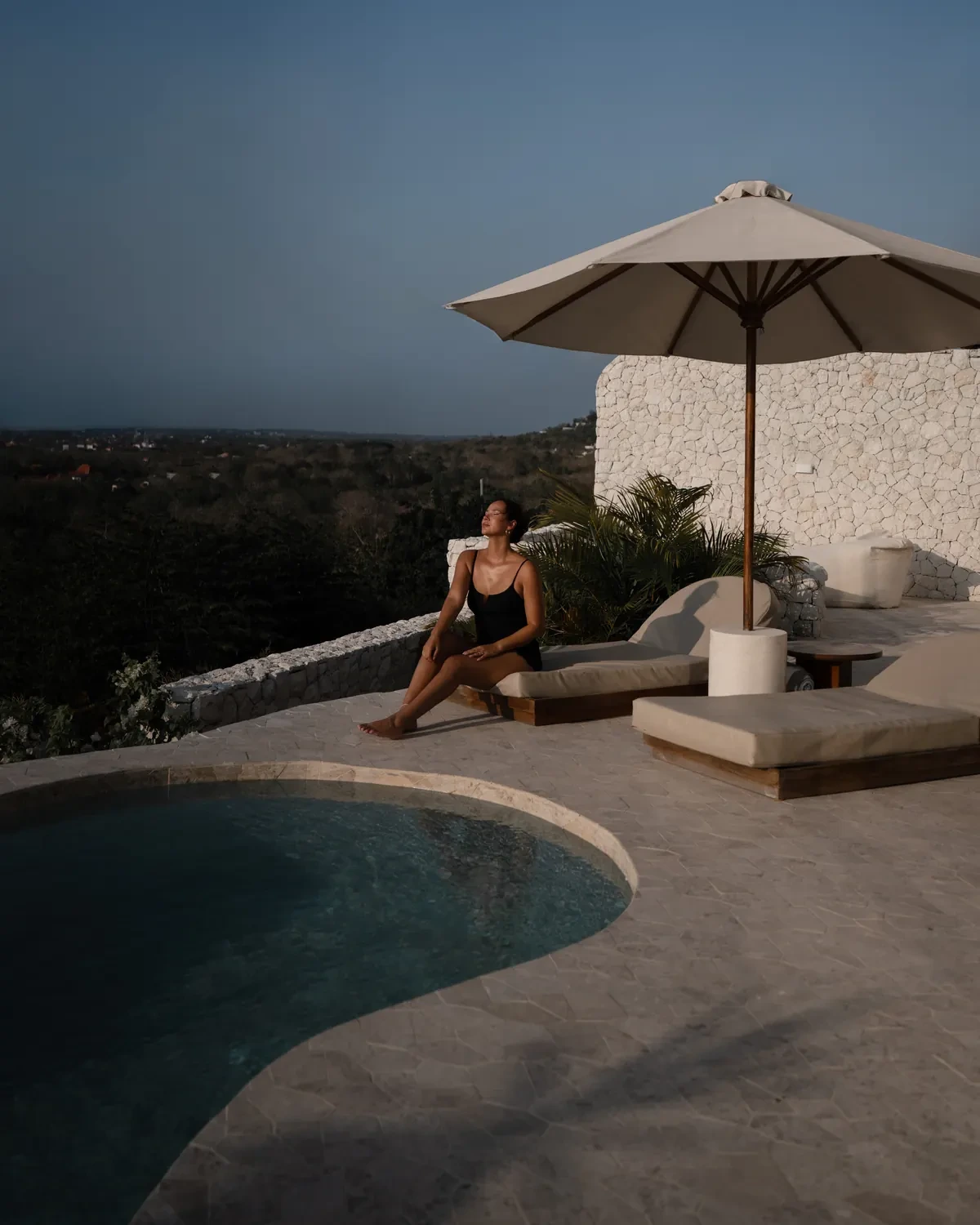 Villa poolside: golden hour portrait overlooking the hills