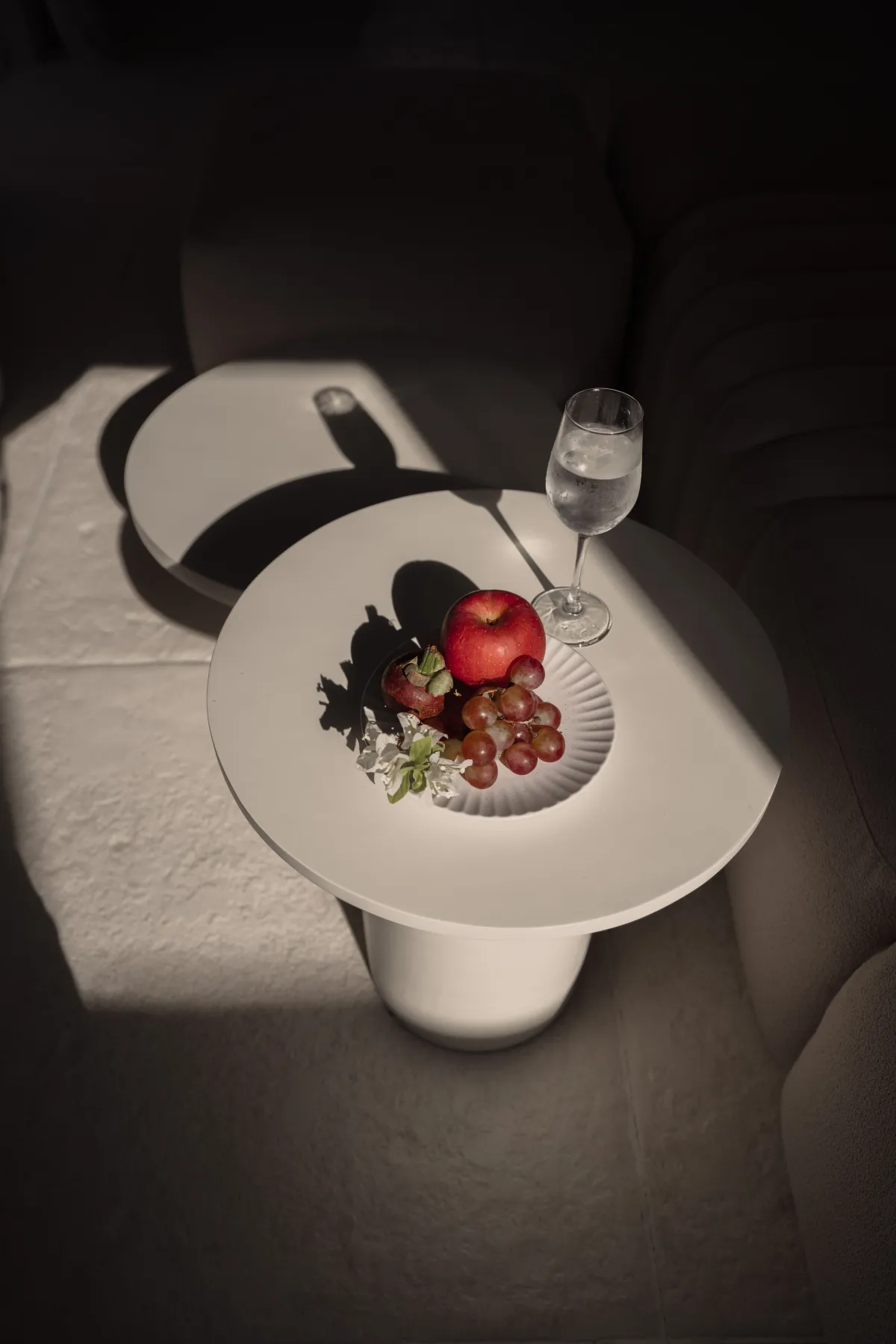 Spaces and architecture: fruit and champagne, poolside side table